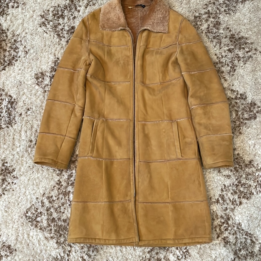 CPL Genuine shearling coat is US size 4
